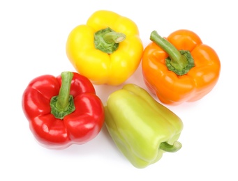Photo of Fresh ripe bell peppers on white background, top view