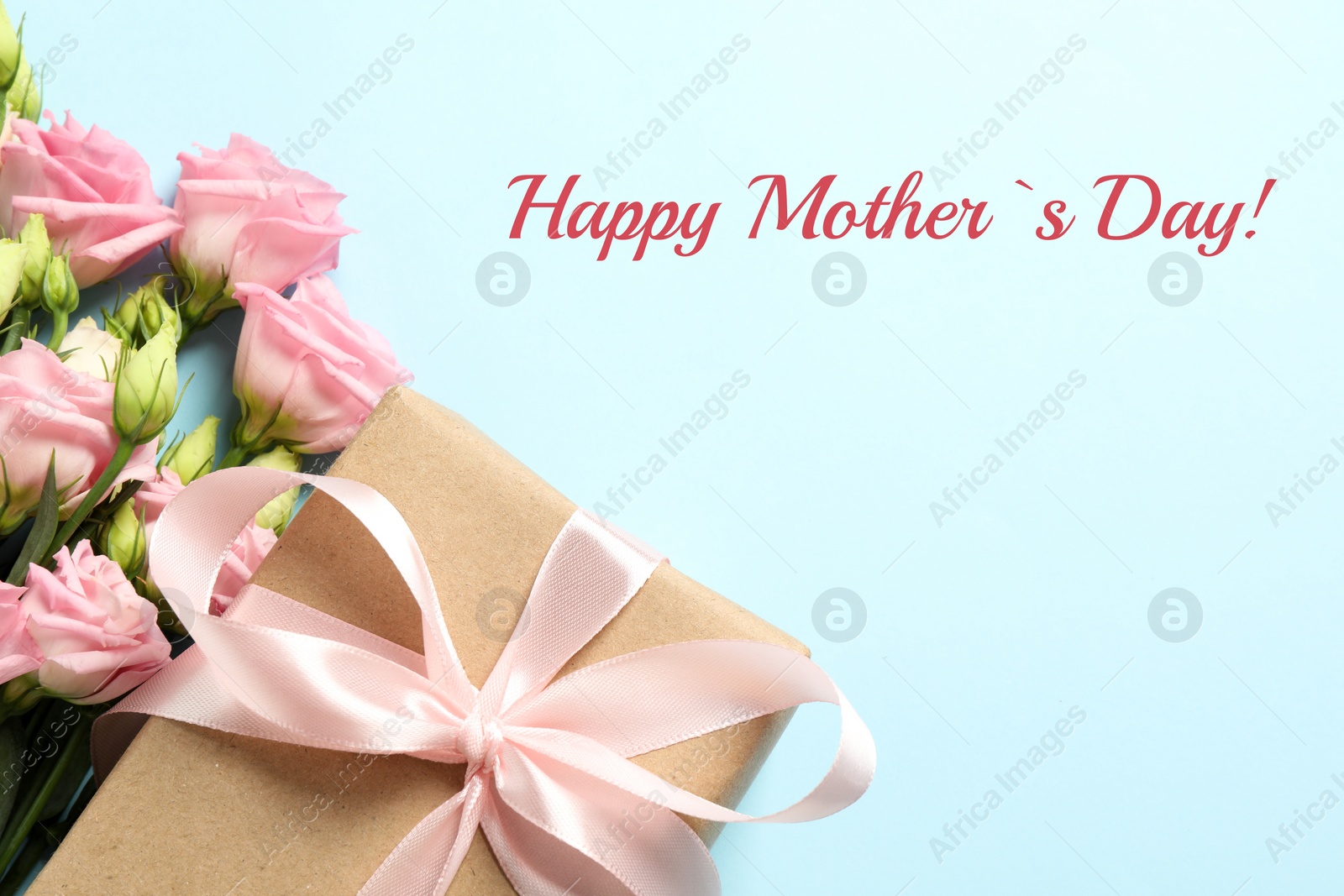 Image of Happy Mother's Day greeting card. Beautiful flowers and gift box on light blue background