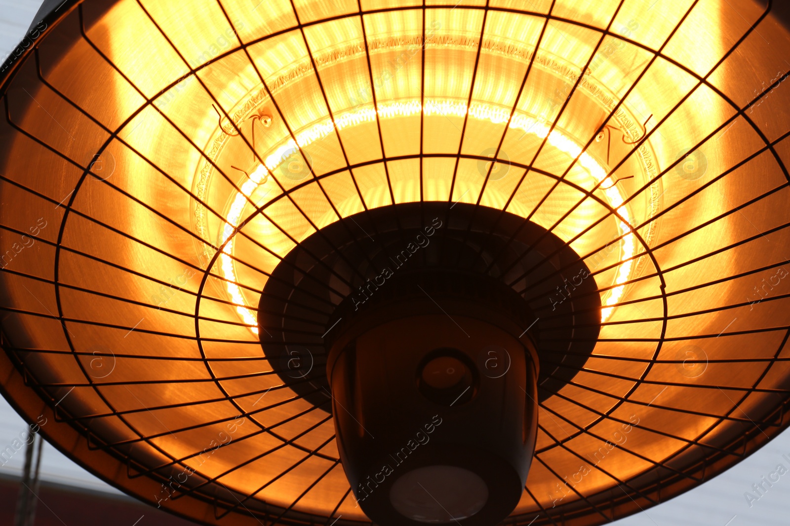 Photo of Closeup view of hanging infrared heater indoors