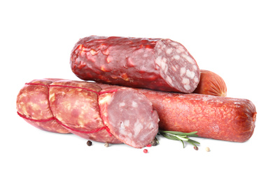 Photo of Different types of sausages on white background