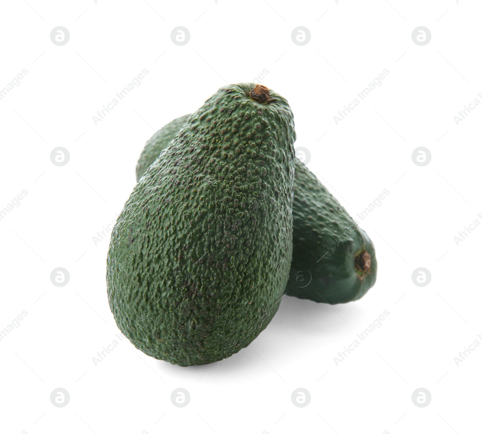 Photo of Ripe avocados on white background. Tropical fruit