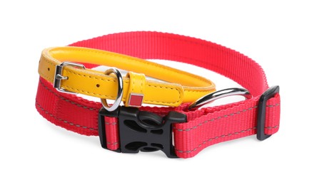 Photo of Different leather and textile dog collars on white background