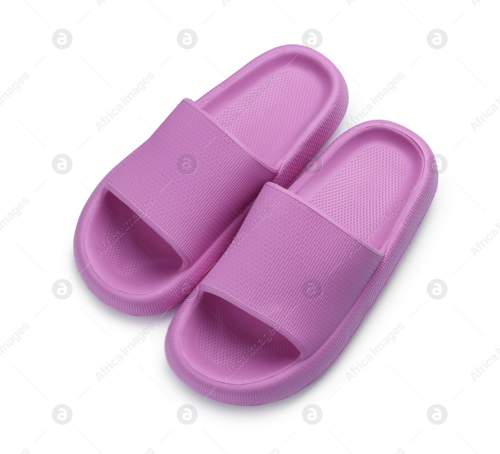 Photo of Pair of rubber slippers isolated on white