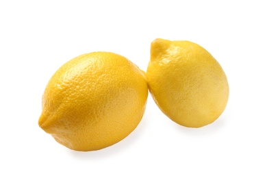 Photo of Ripe whole lemons on white background