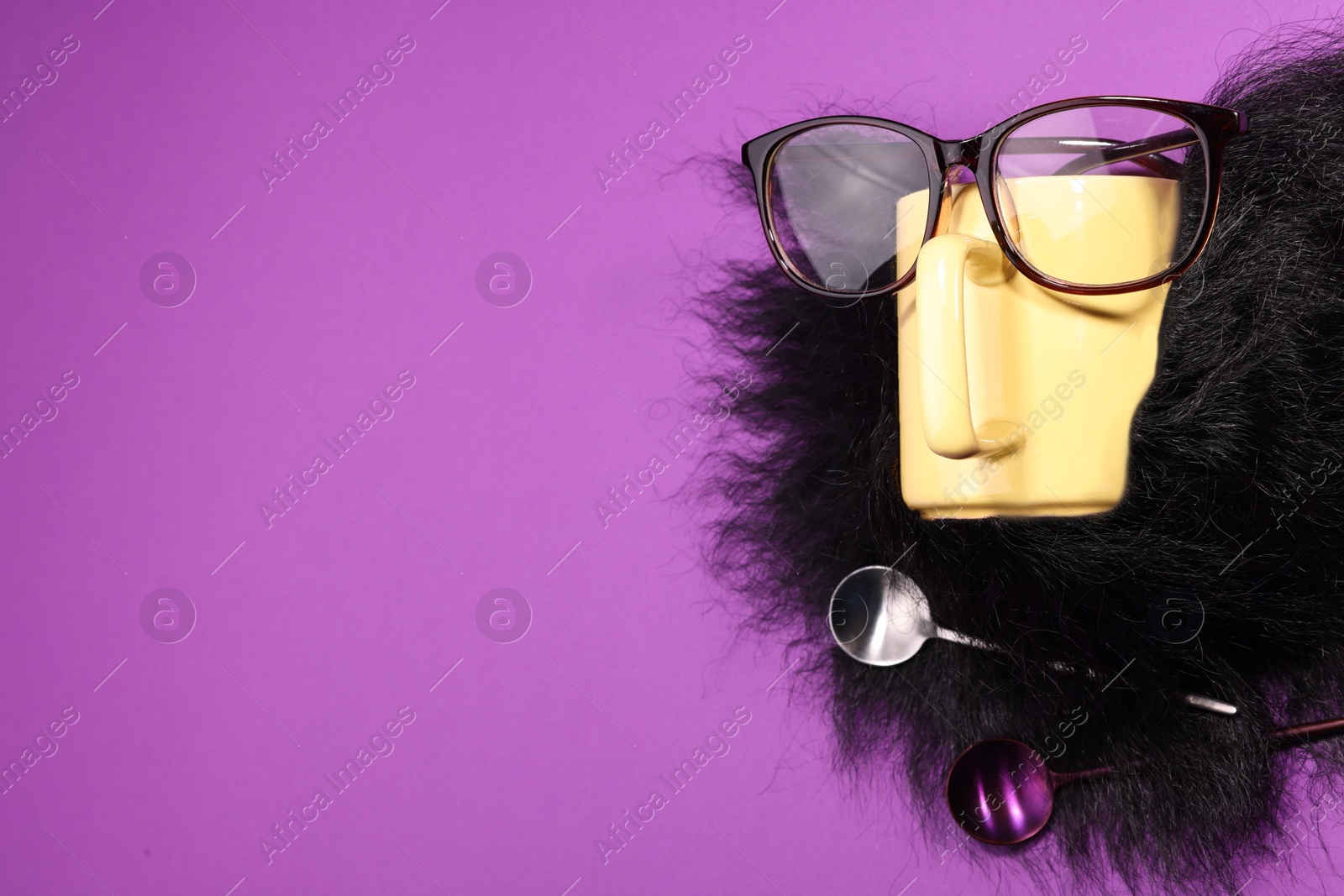 Photo of Man's face made of artificial beard, cup and glasses on purple background, top view. Space for text