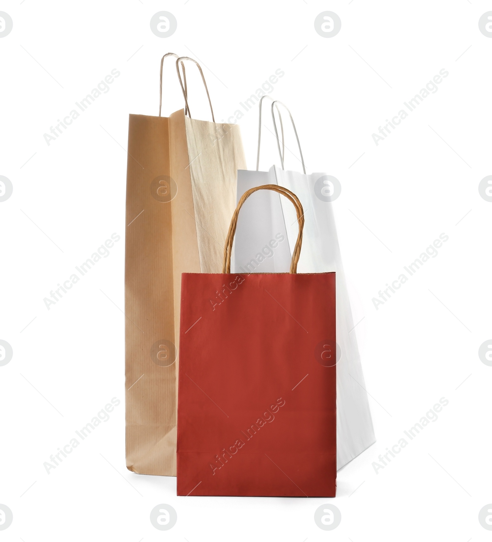 Photo of Mockup of paper shopping bags on white background