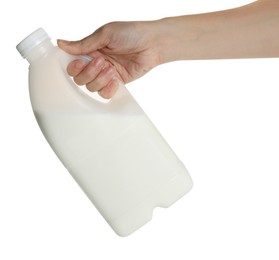 Photo of Woman holding gallon bottle of milk on white background, closeup