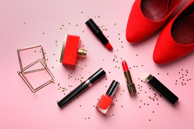 Flat lay composition with decorative cosmetics on color background