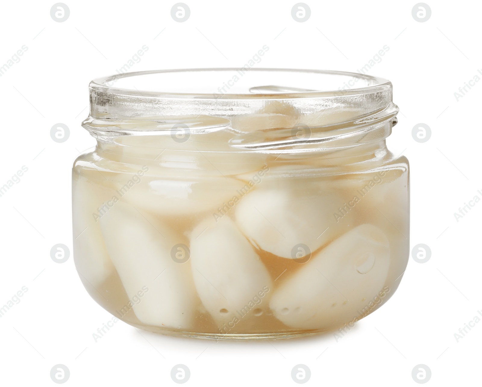 Photo of Glass jar with preserved garlic on white background