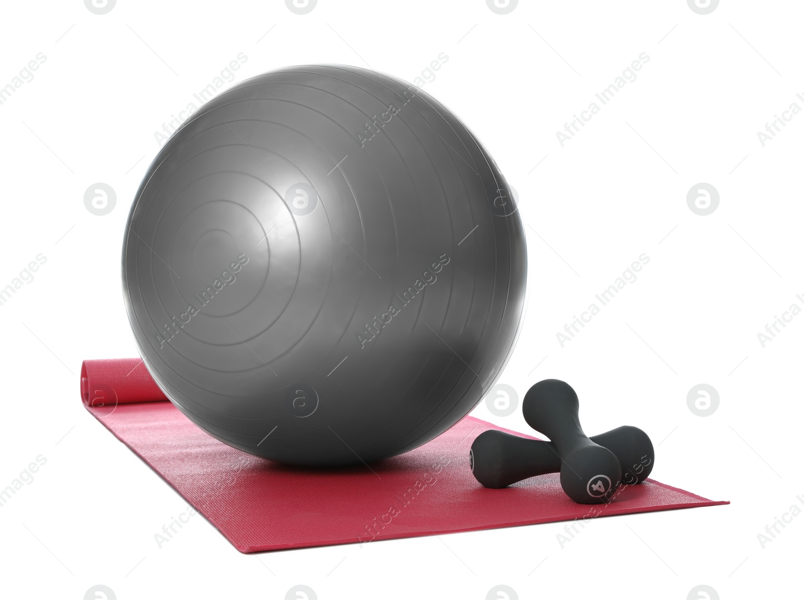 Photo of Fitness ball, dumbbells and yoga mat isolated on white