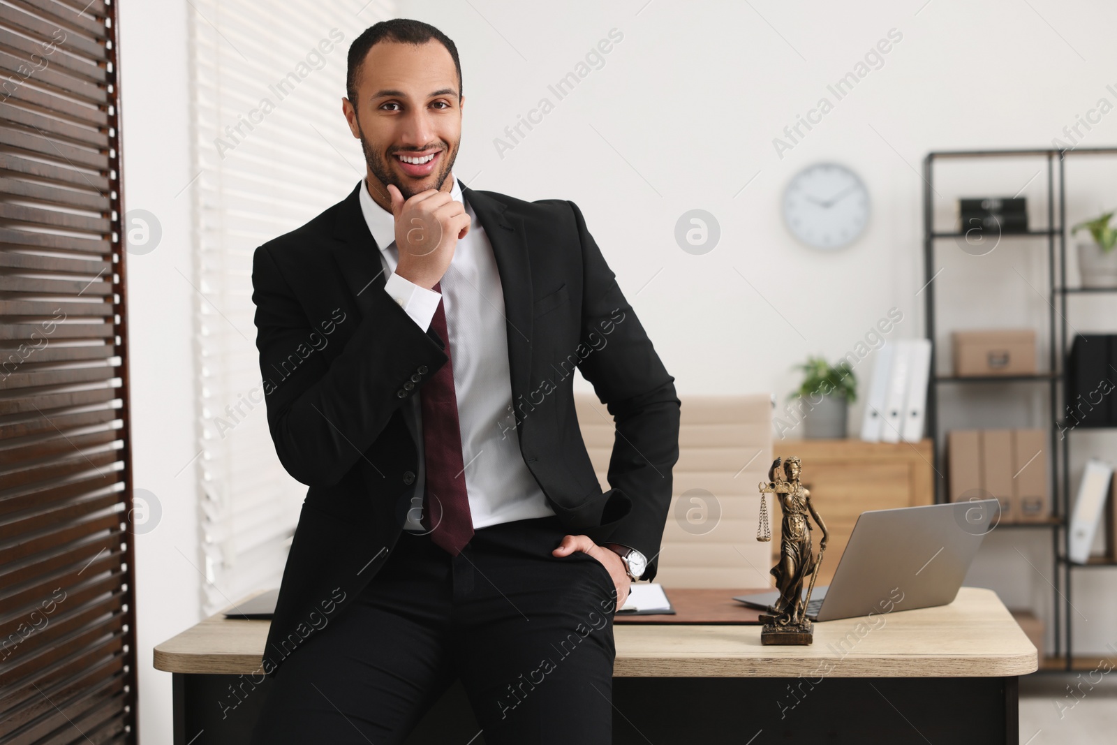 Photo of Portrait of smiling lawyer in office, space for text