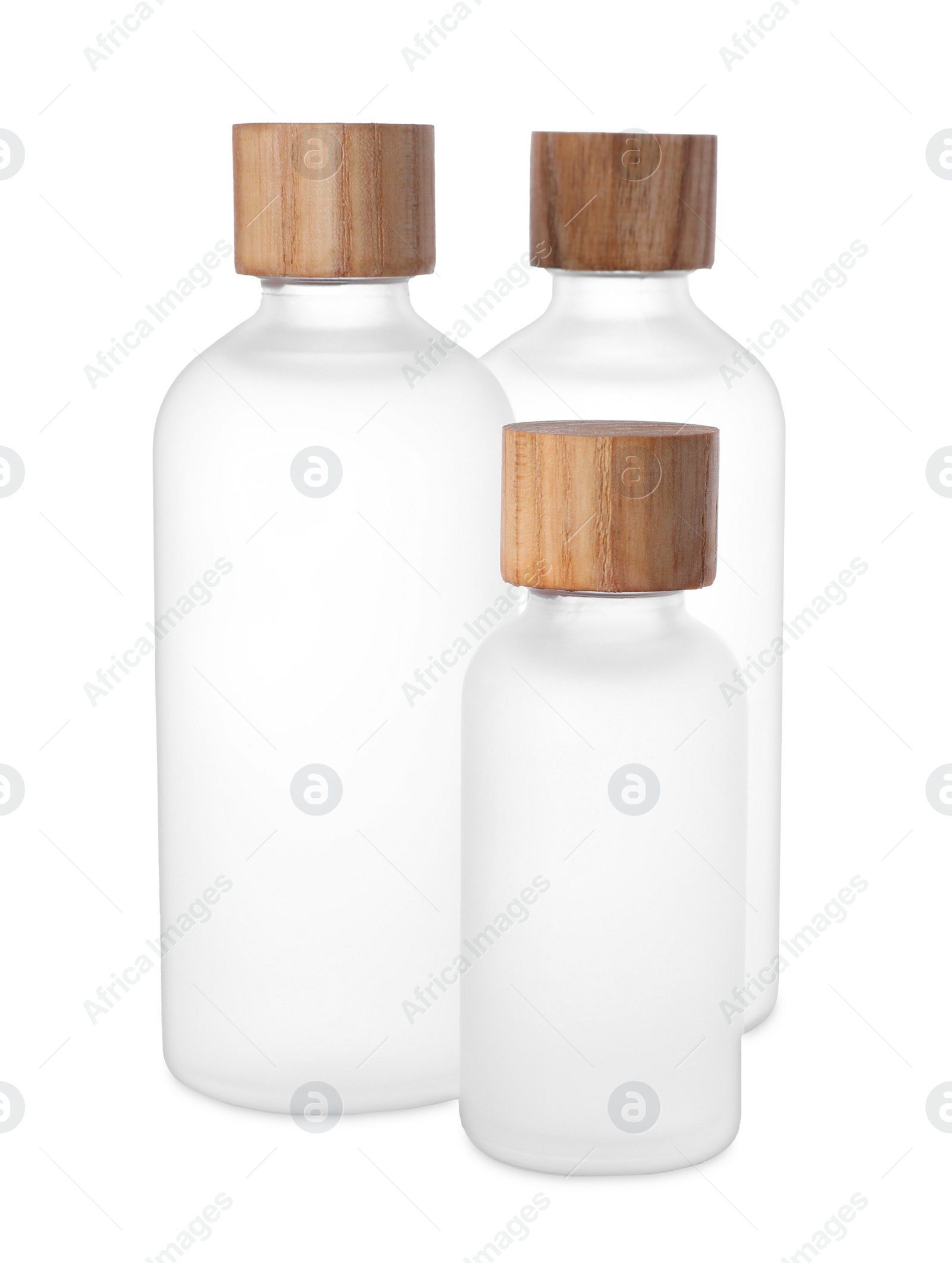 Photo of Bottles of essential oil on white background