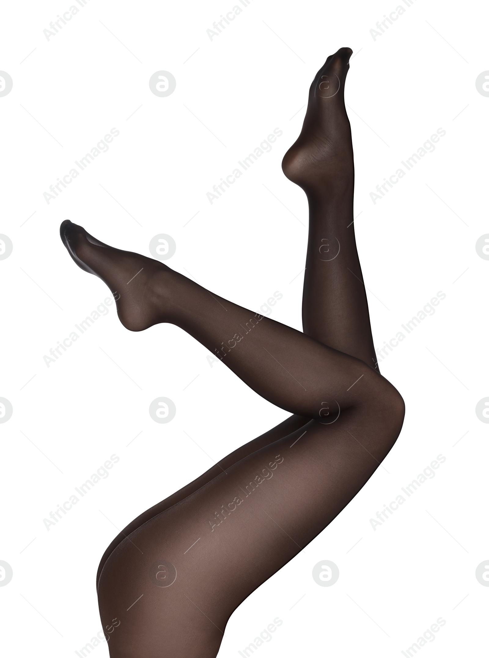 Photo of Woman with beautiful long legs wearing black tights on white background, closeup