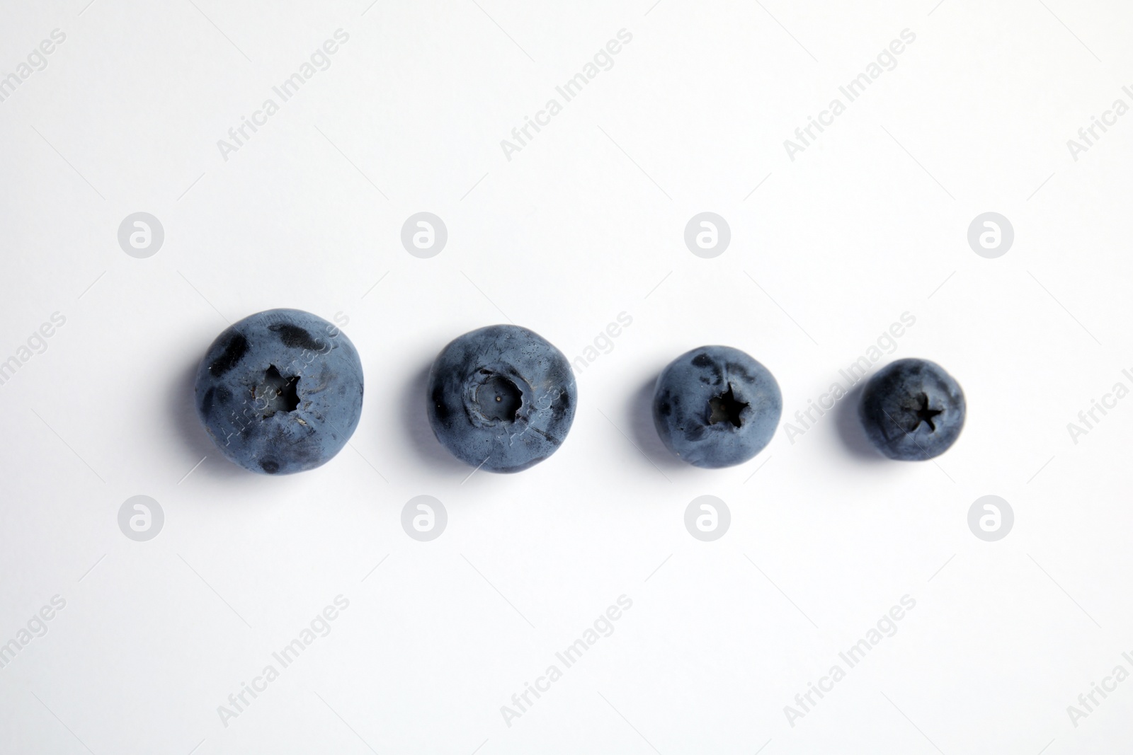 Photo of Flat lay composition with tasty blueberry on white background