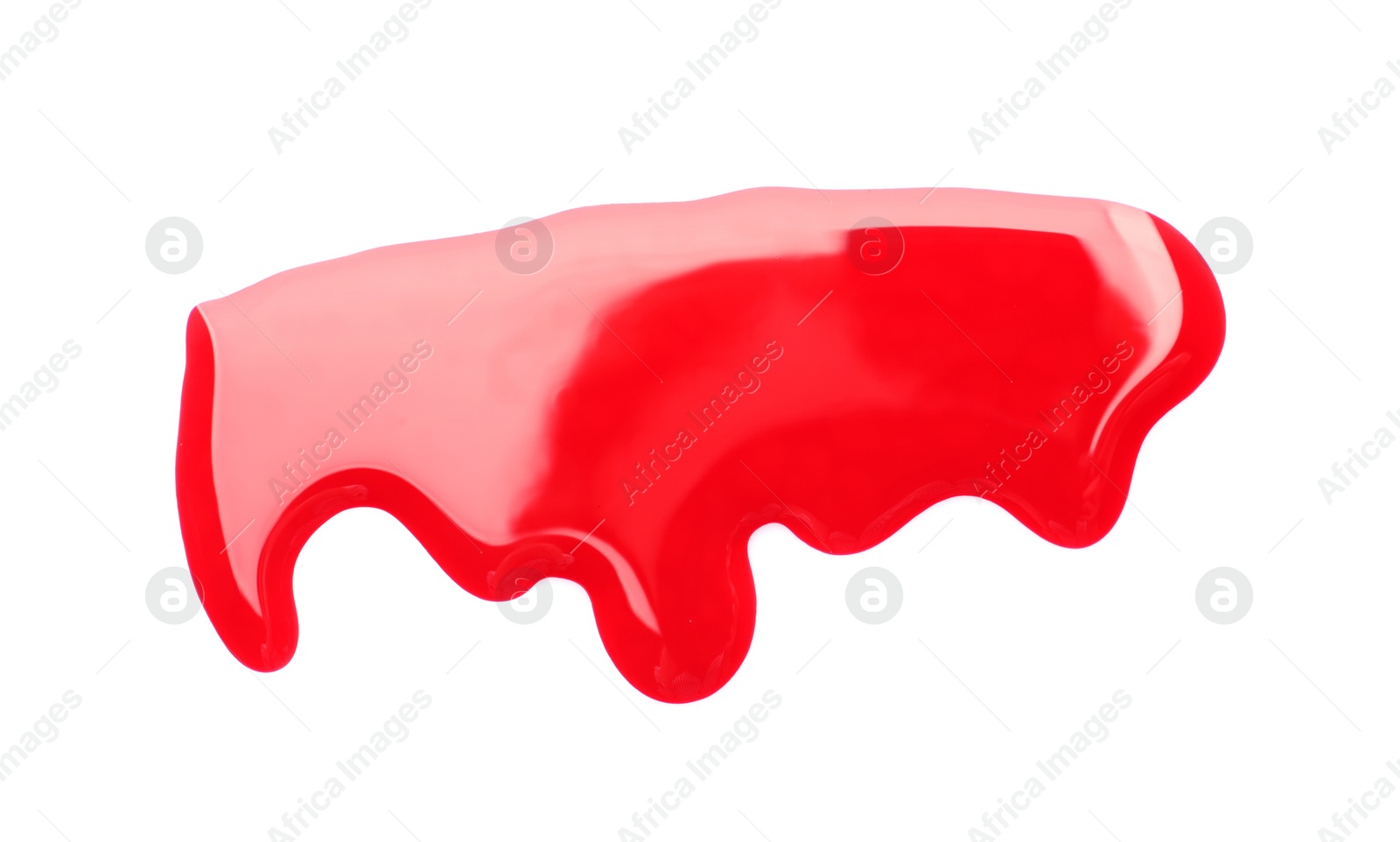 Photo of Colorful nail polish spilled on white background