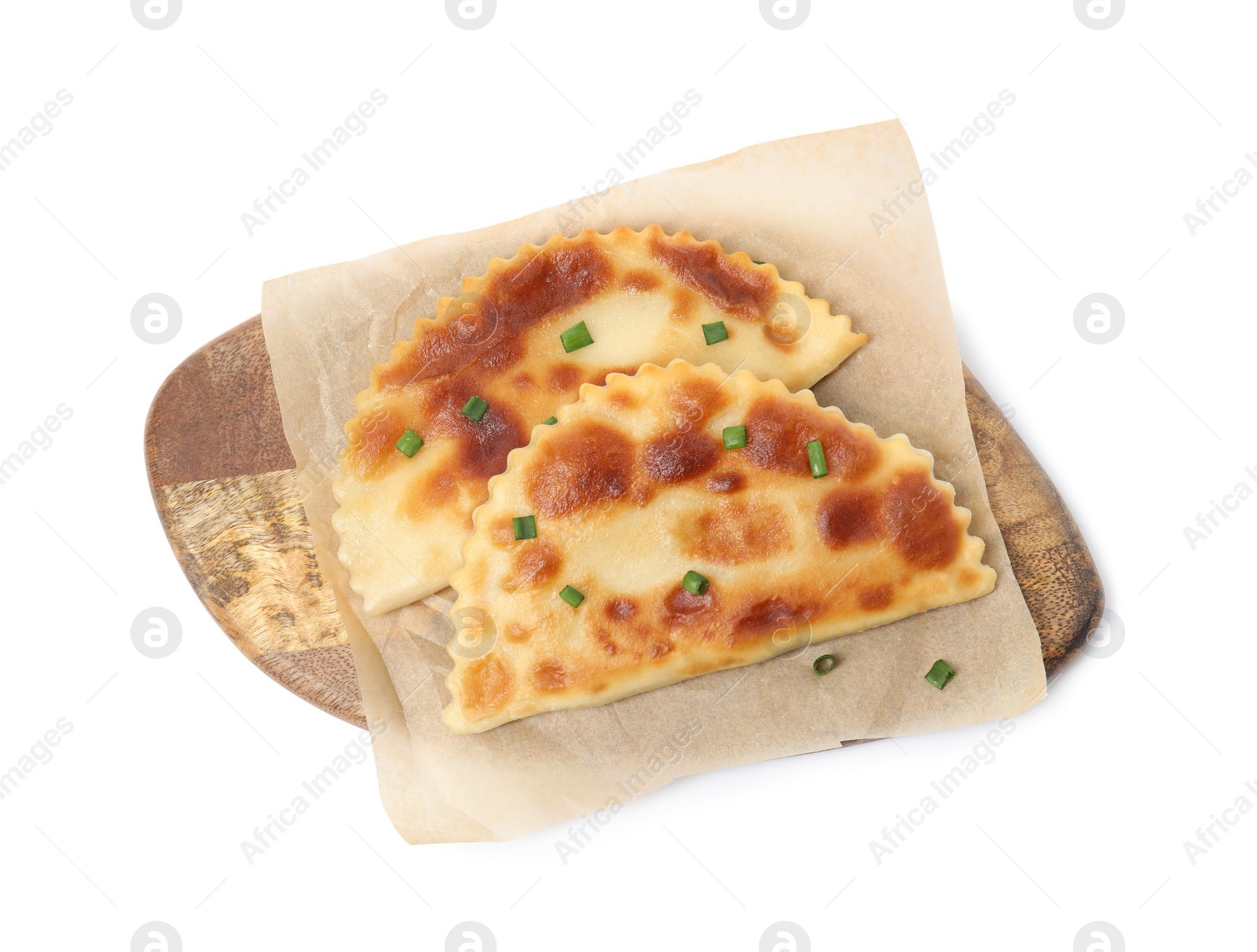 Photo of Board with delicious fried chebureki isolated on white, top view