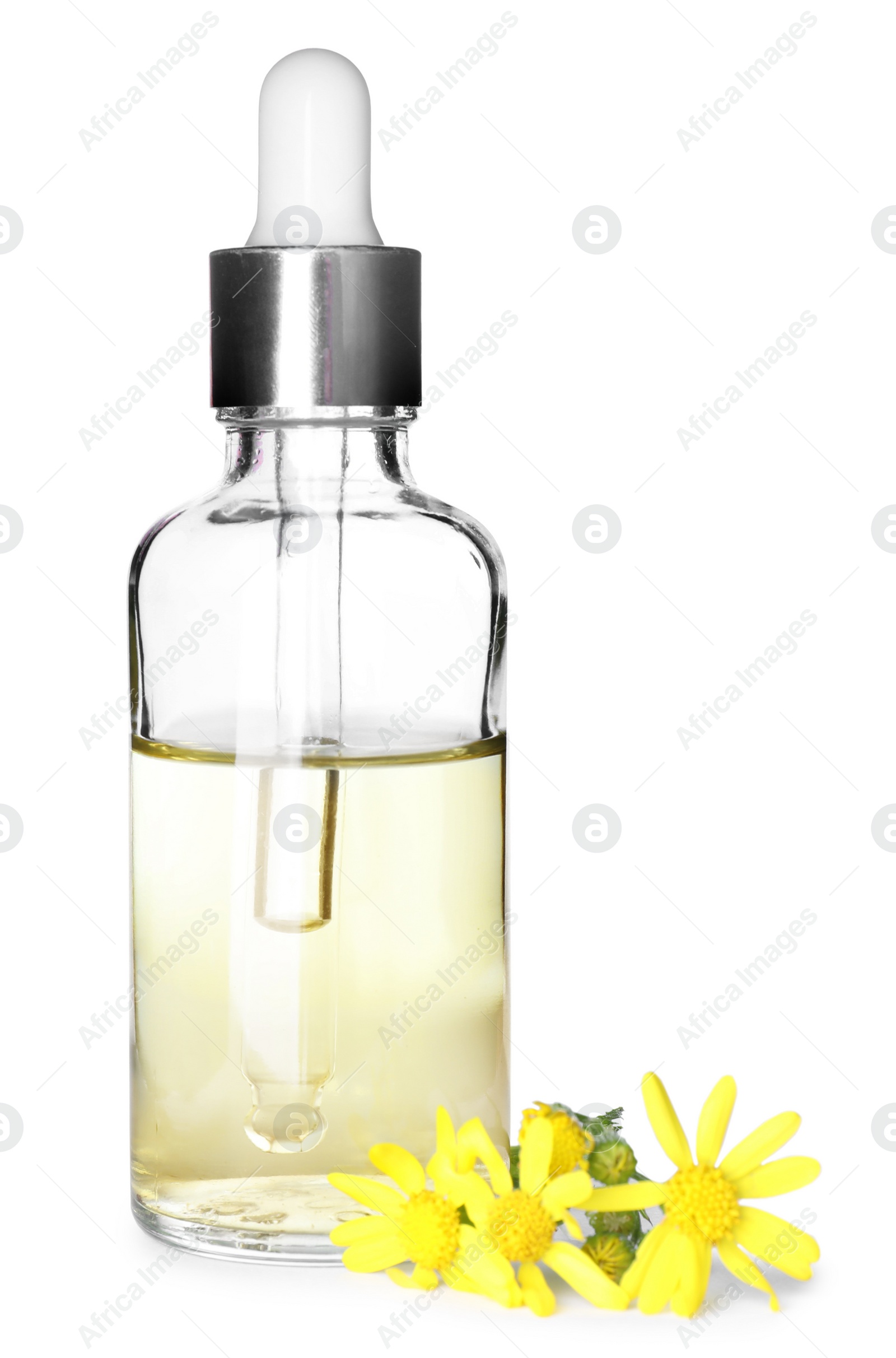Photo of Bottle of herbal essential oil and flowers isolated on white