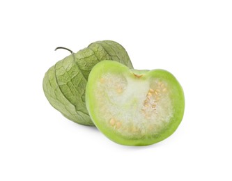 Fresh green tomatillos with husk isolated on white
