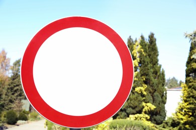 Photo of No Vehicles sign outdoors on sunny day. Space for text