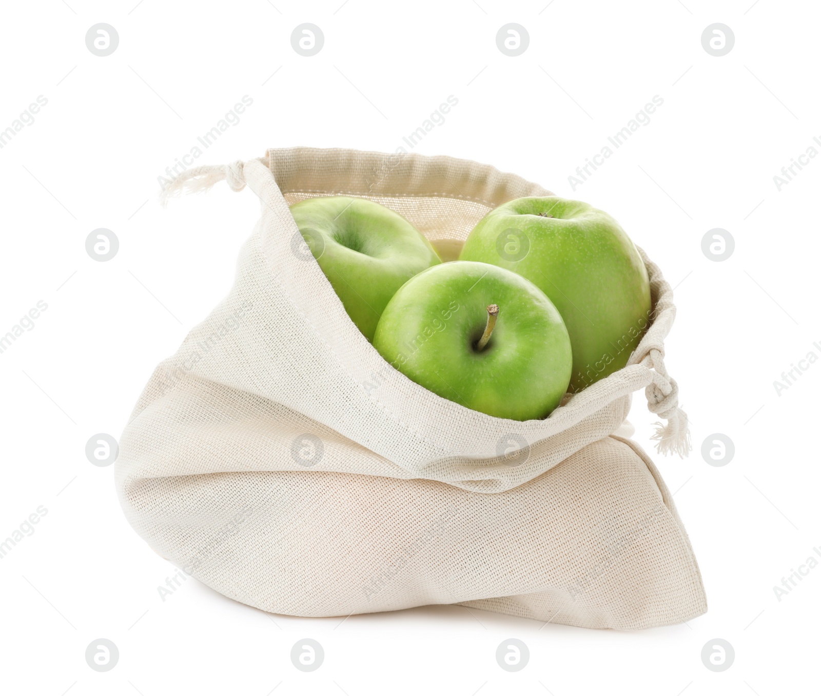 Photo of Cotton eco bag with apples isolated on white