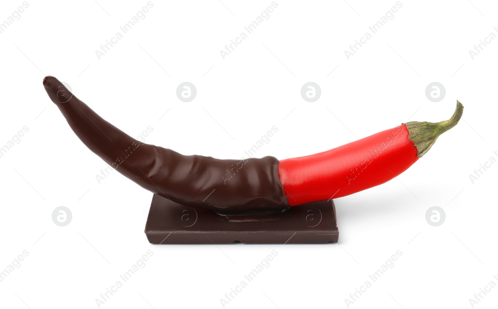 Photo of Red hot chili pepper and dark chocolate isolated on white