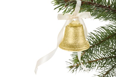 Photo of Christmas bell with bow hanging on fir tree branch against white background