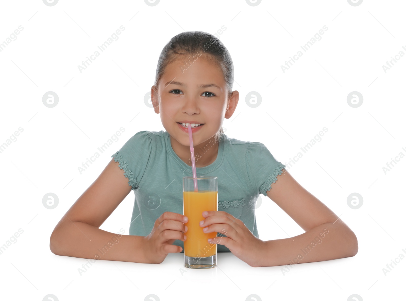 Photo of Cute happy girl with glass of juice and straw isolated on white