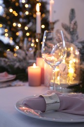 Photo of Beautiful festive table setting with Christmas decor indoors, space for text