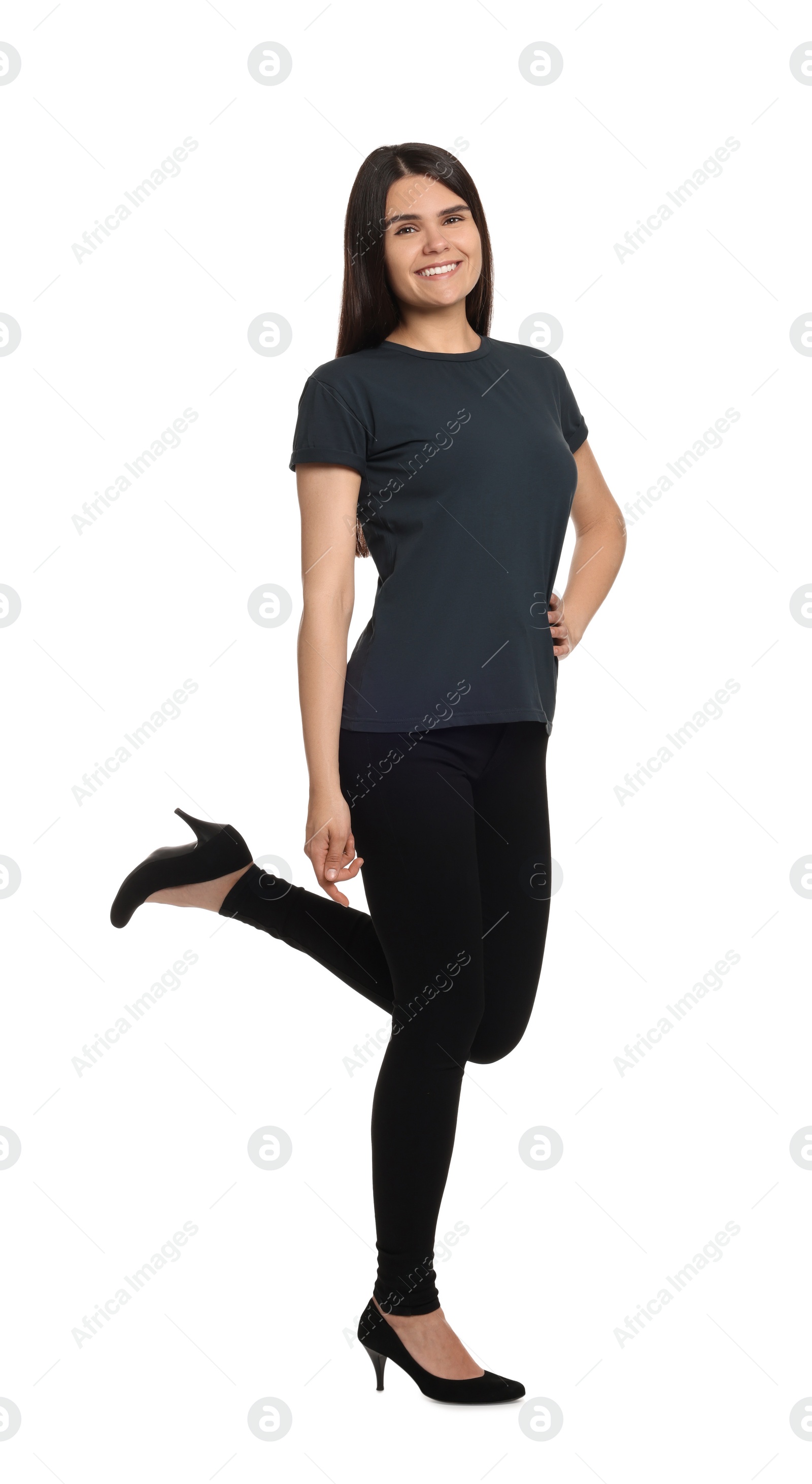 Photo of Woman wearing stylish black jeans and high heels shoes on white background