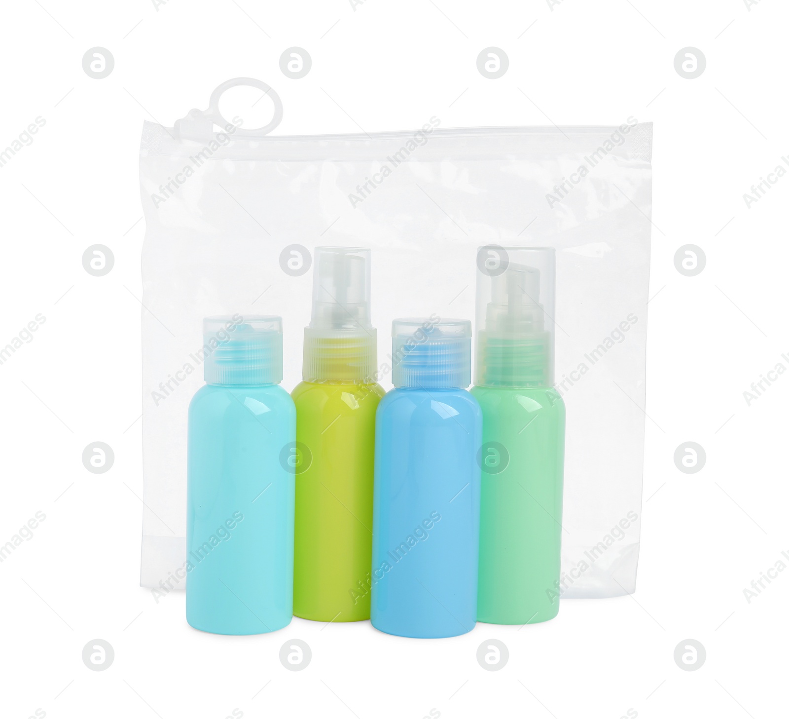 Photo of Cosmetic travel kit in plastic bag isolated on white. Bath accessories