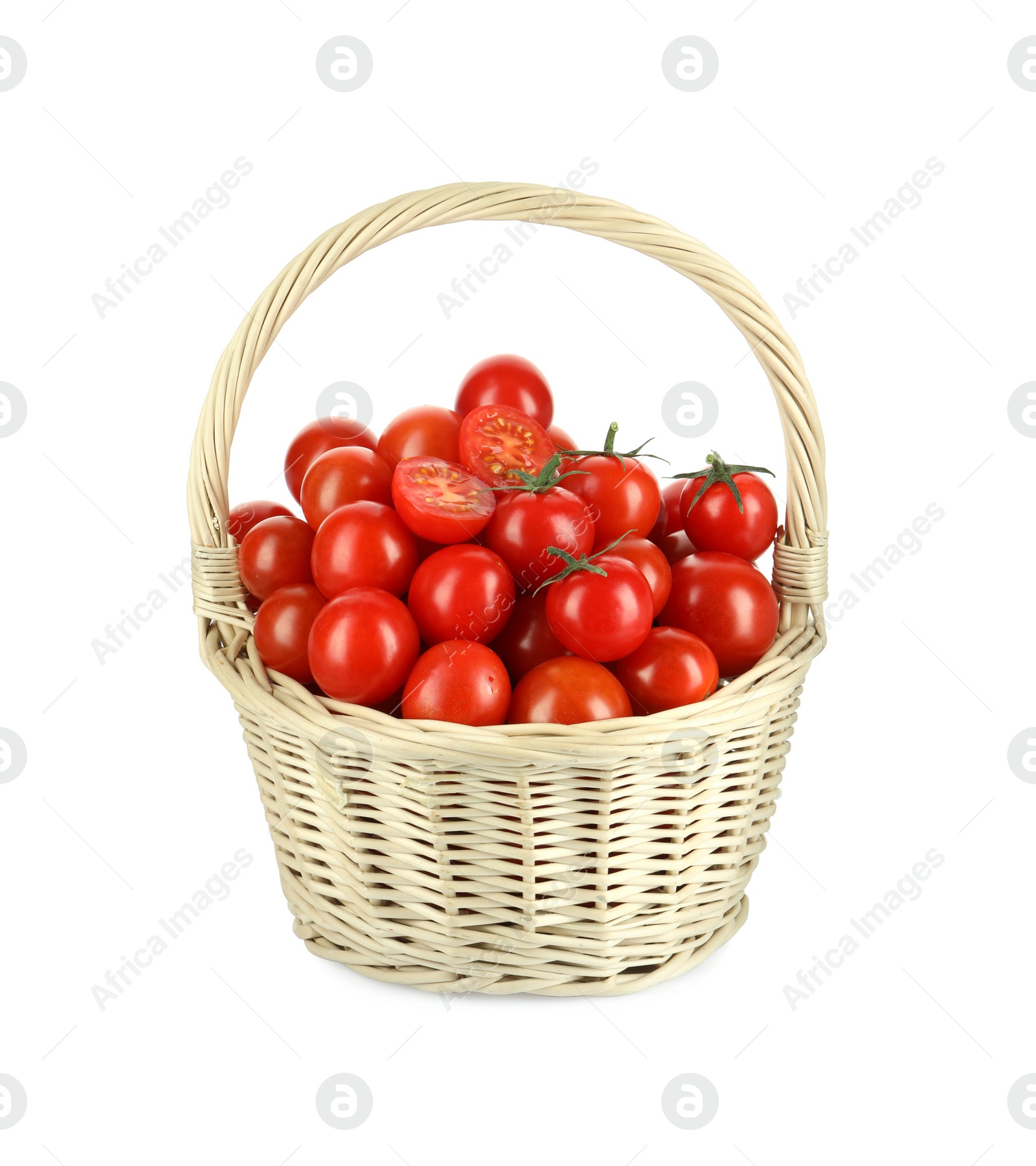 Photo of Wicker basket with fresh ripe cherry tomatoes isolated on white