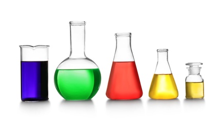 Laboratory glassware with different samples on white background. Solution chemistry