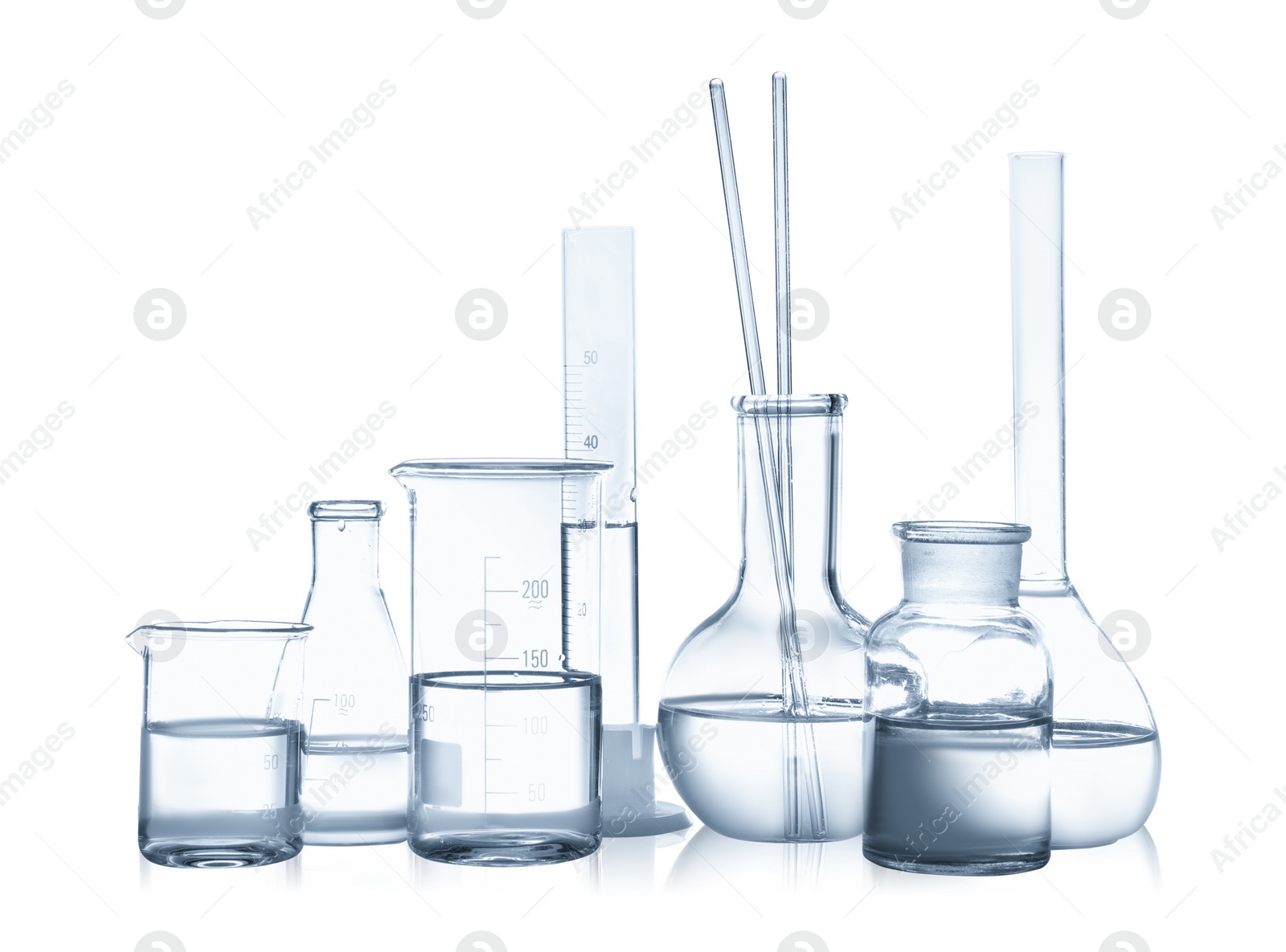 Photo of Laboratory glassware with liquid isolated on white