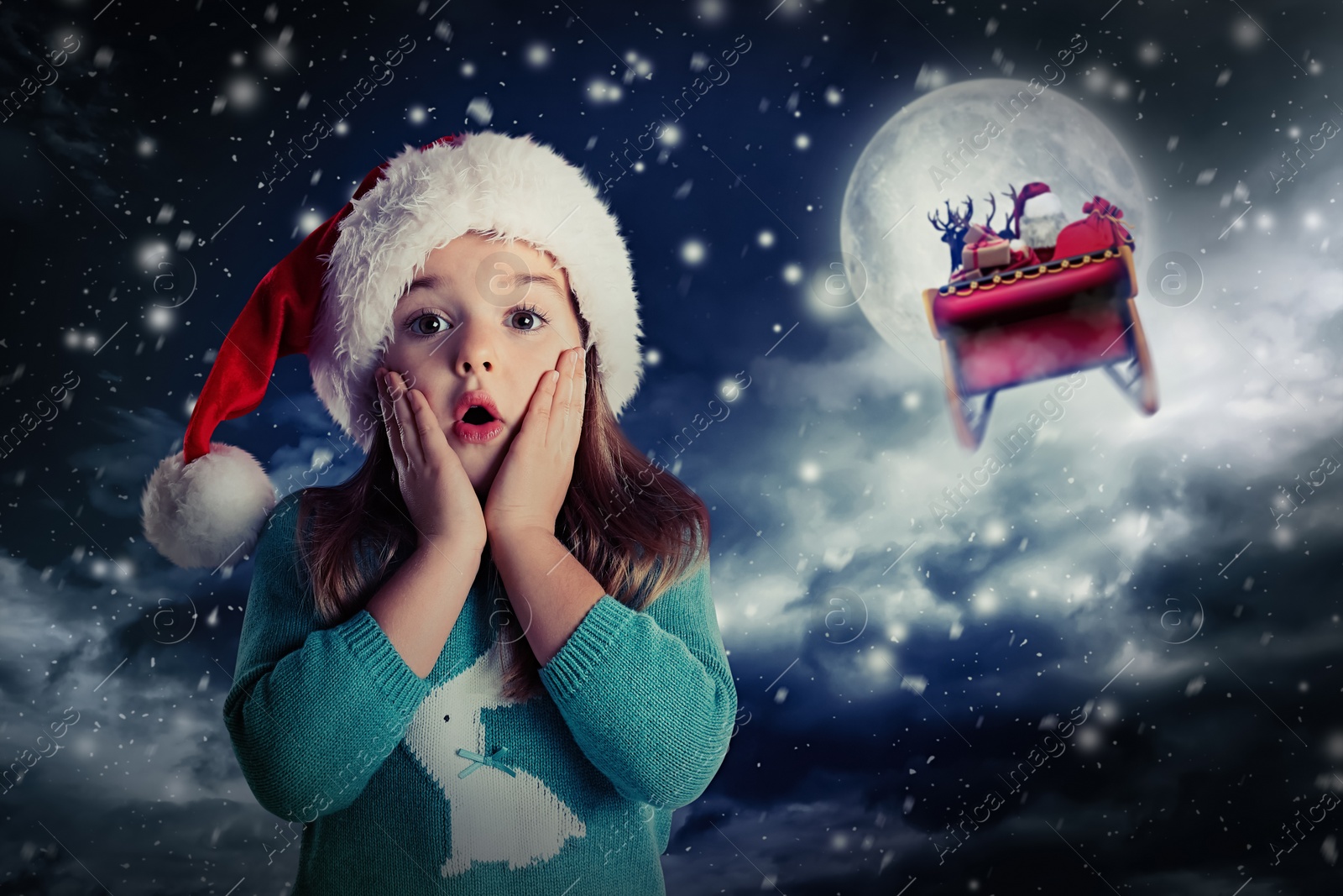 Image of Cute little child and Santa Claus flying in his sleigh on background. Christmas celebration