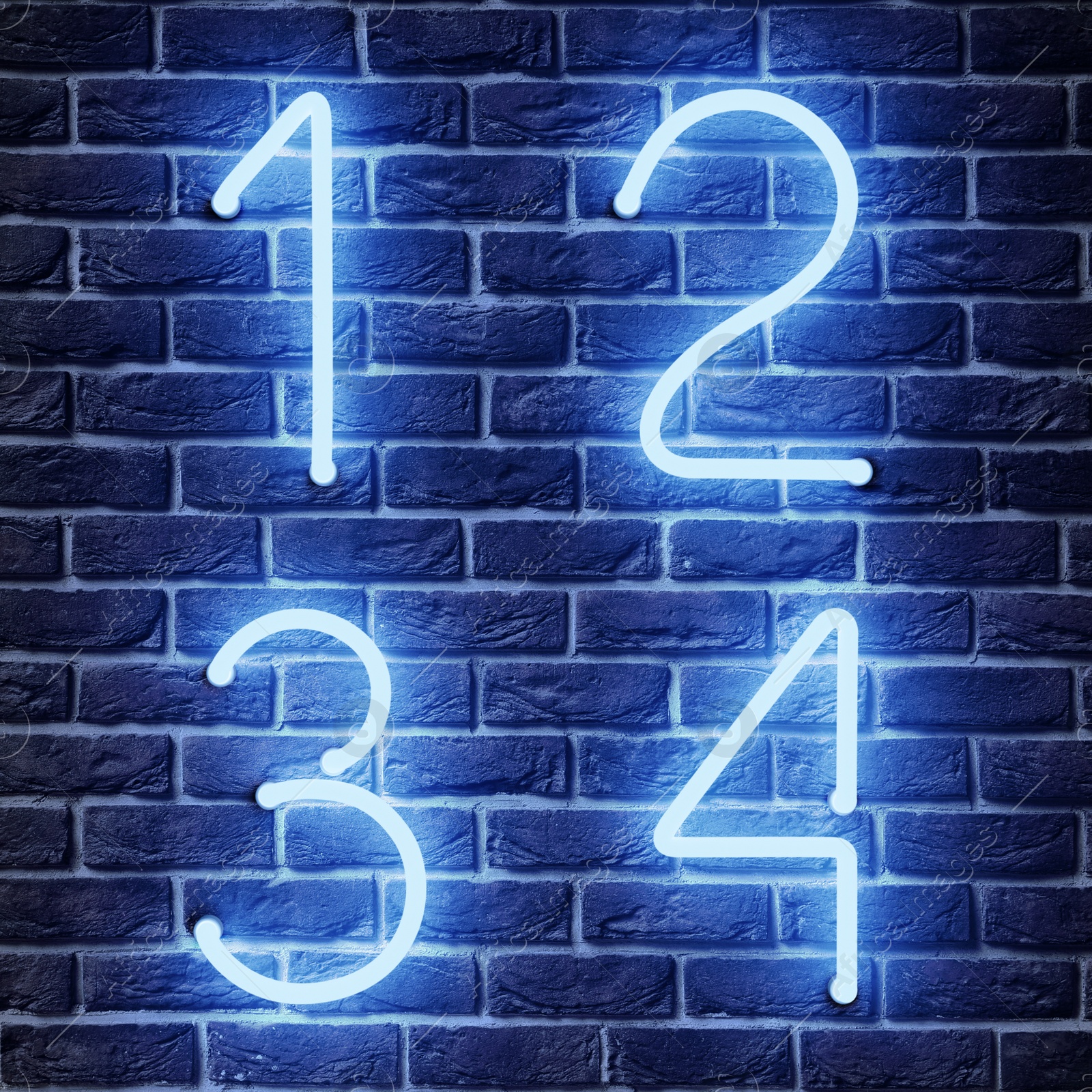 Image of Glowing neon number (1, 2, 3, 4) signs on brick wall