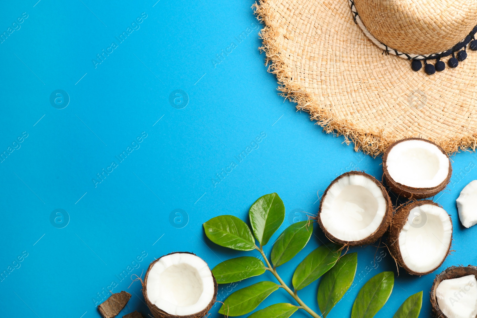 Photo of Flat lay composition with coconuts and space for text on color background