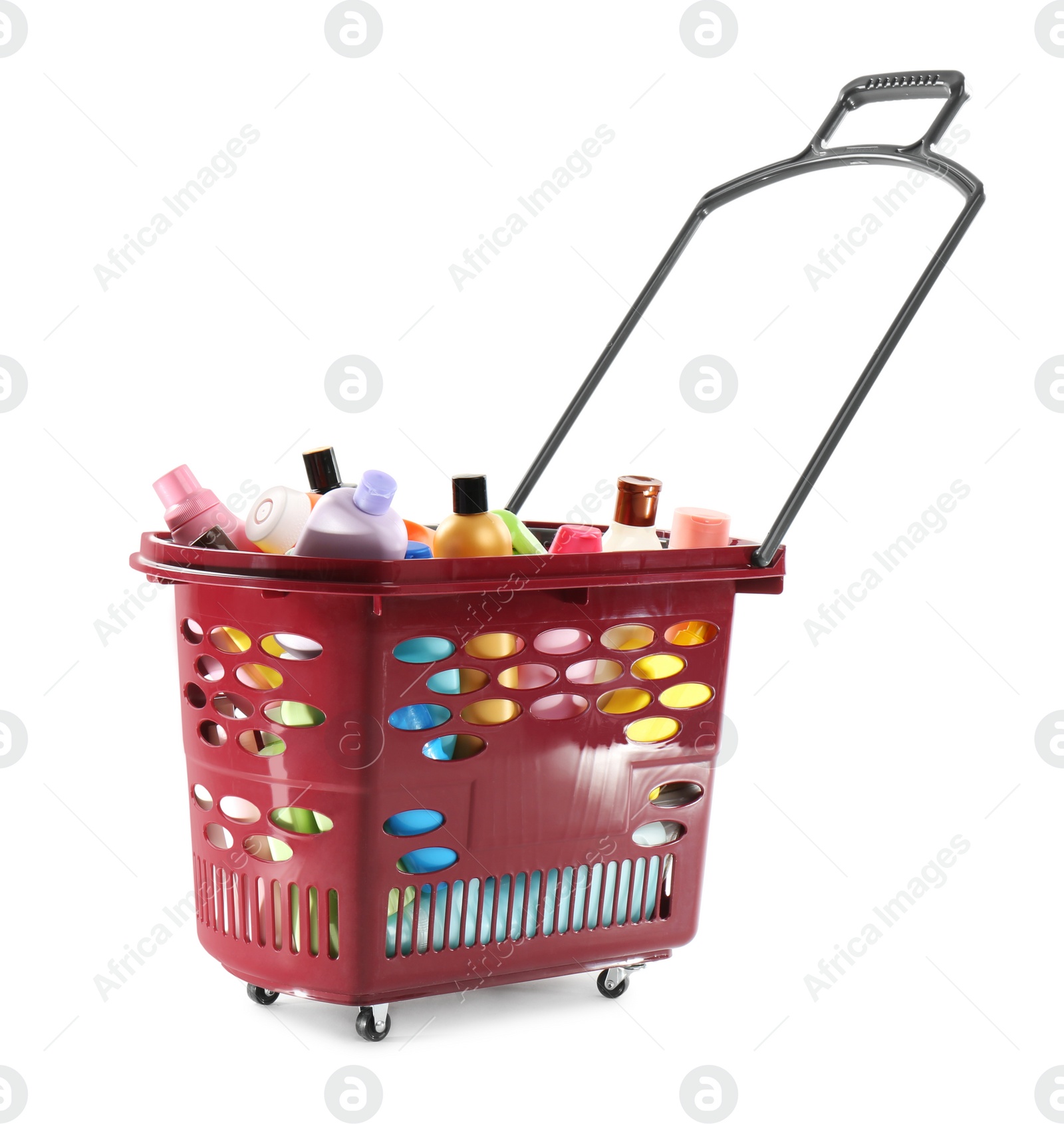 Photo of Shopping basket full of cleaning supplies isolated on white