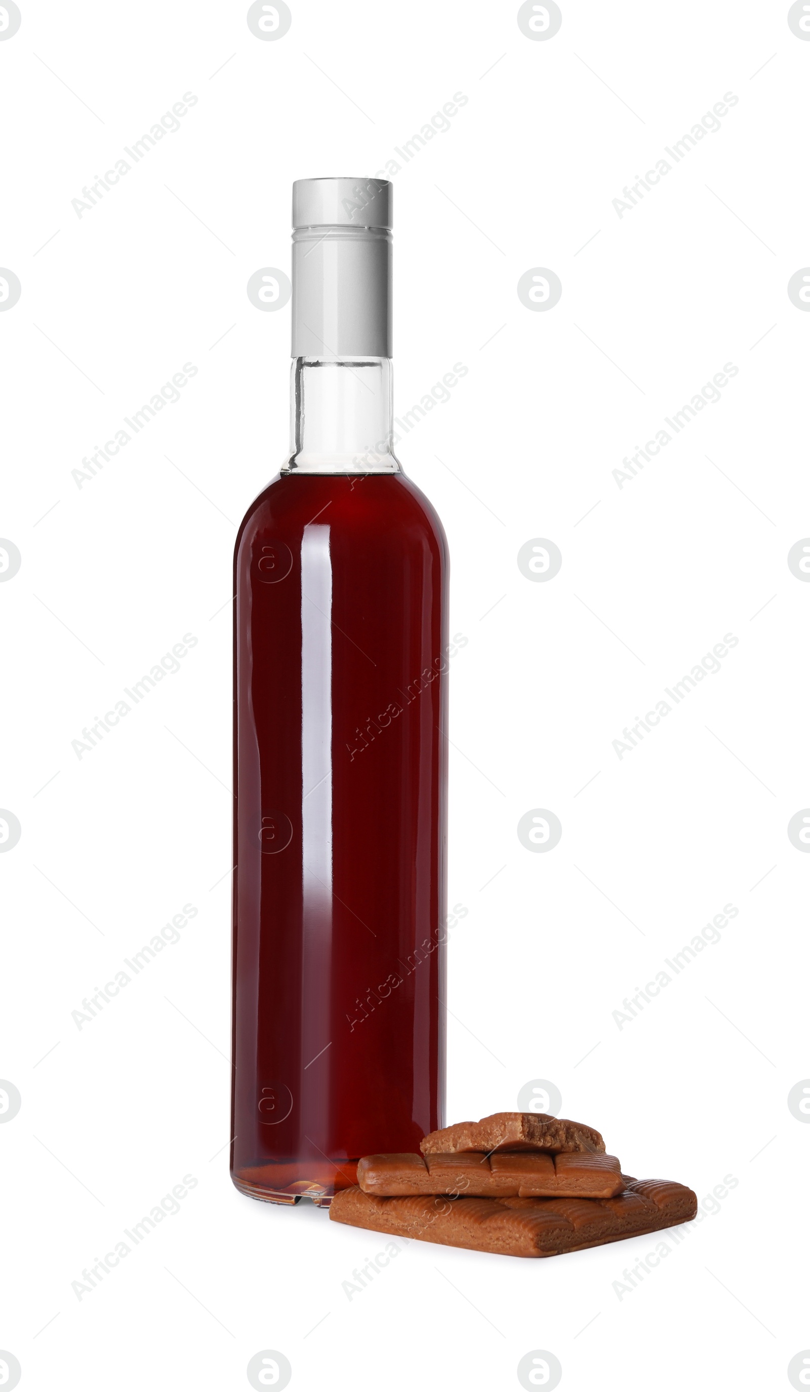 Photo of Delicious syrup for coffee and caramel candies on white background