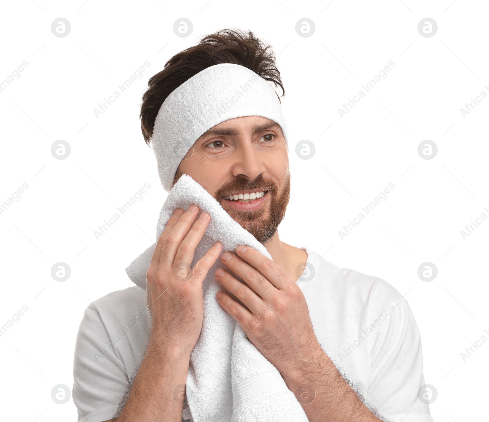 Photo of Washing face. Man with headband and towel on white background