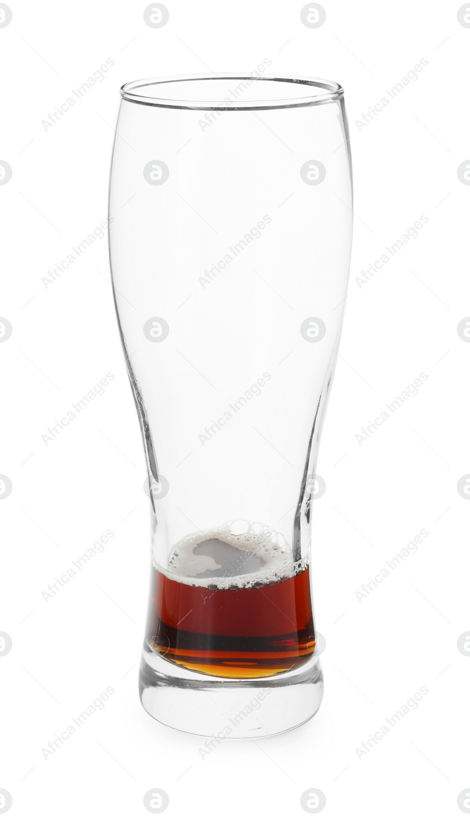 Photo of Almost empty glass of beer isolated on white