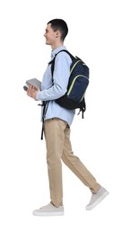 Photo of Young man with backpack and books on white background