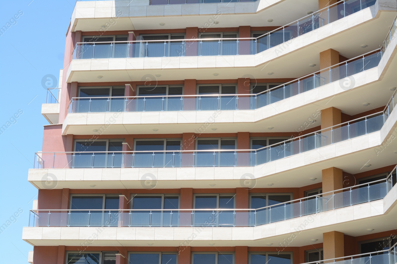 Photo of Exterior of beautiful residential building with balconies