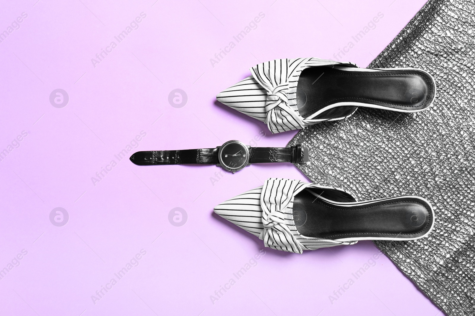 Photo of Flat lay composition with lady's shoes on color background. Space for text