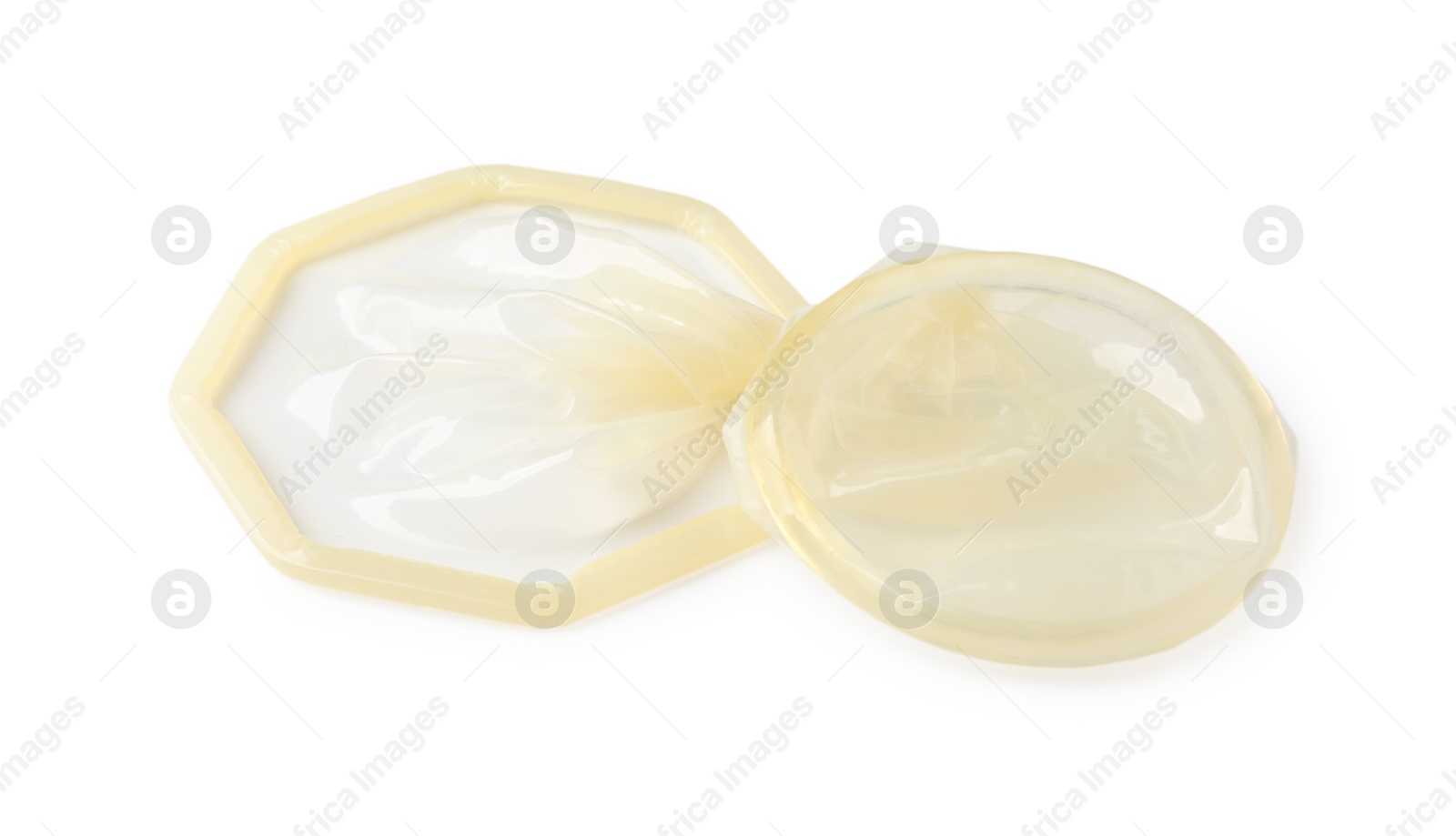 Photo of Unrolled female condom isolated on white. Safe sex