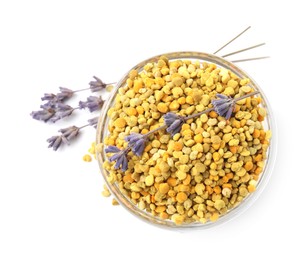 Photo of Fresh bee pollen granules in bowl and lavender isolated on white, top view