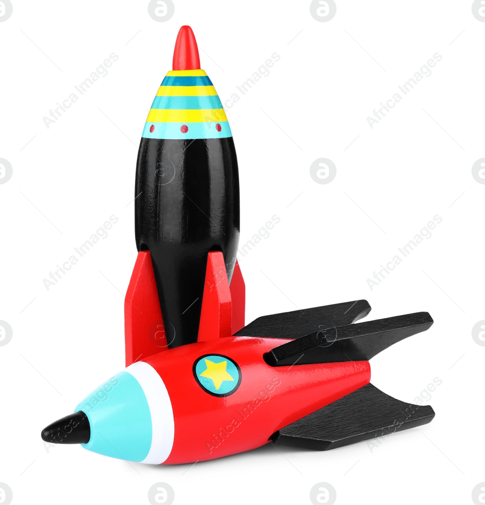 Photo of Bright modern toy rockets isolated on white