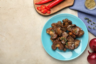 Photo of Delicious kidneys with thyme and ingredients on light table, flat lay. Space for text