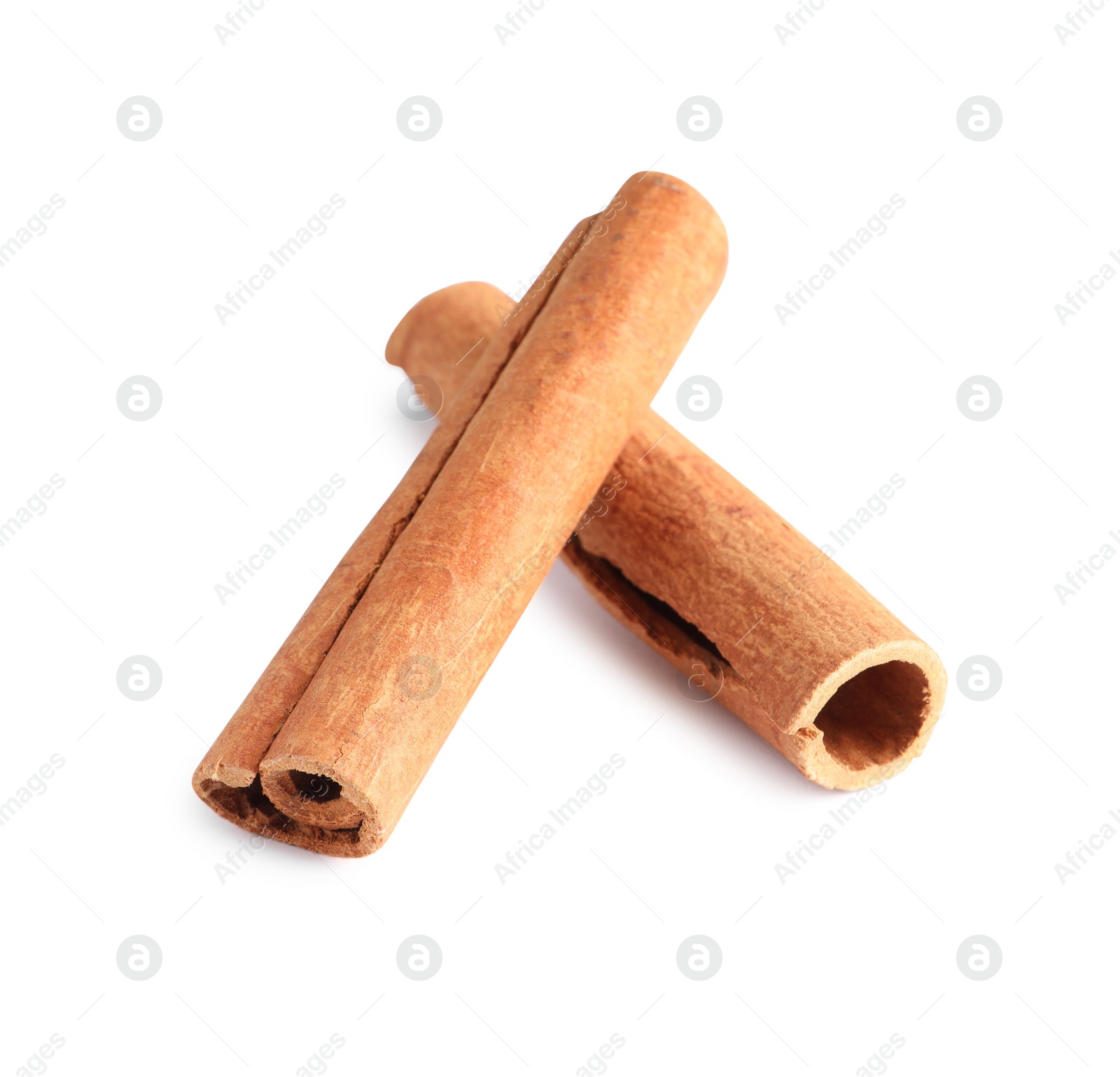 Photo of Two aromatic cinnamon sticks isolated on white