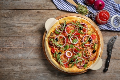 Photo of Flat lay composition with tasty homemade pizza and space for text on table