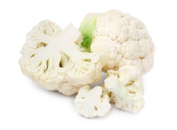 Photo of Cut and whole cauliflowers on white background